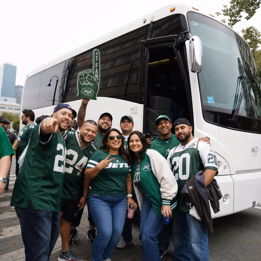 Passengers loading luggage while boarding an Jersey City group shuttle
