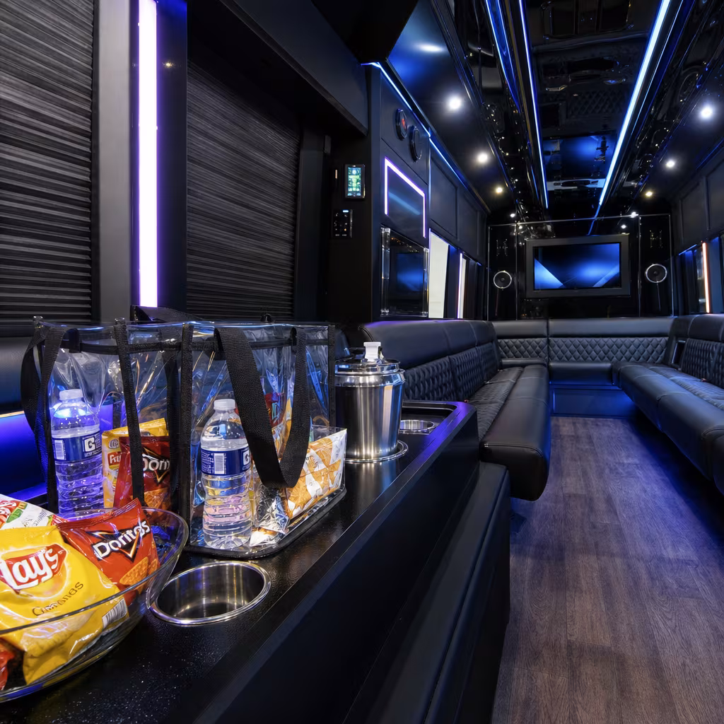 Party bus interior with wraparound leather seating and LED lighting in Jersey City